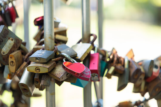 Red heart love lock symbolizing eternal commitment in Pecs Hungary