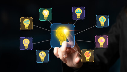 Conceptual Image of a Hand Touching a Digital Interface of Light Bulbs Representing Ideas, Innovation, and Creative Thinking in a Modern Business Environment. Entropy. © InfiniteFlow