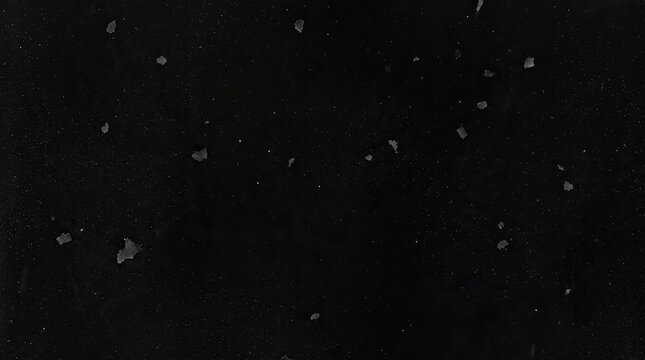 Black textured background with dust particles and scratches