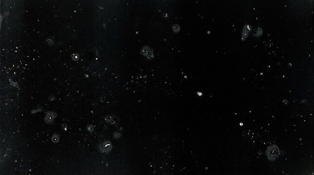Grunge film texture with dust and scratches on black background