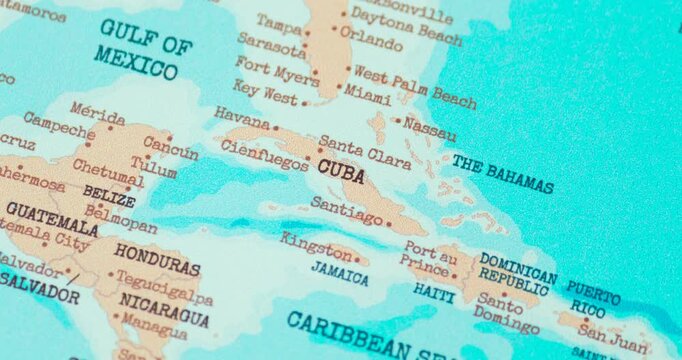 Zoom in view of cuba on a vintage political world map