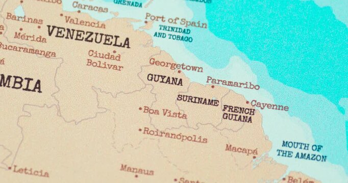 Zoom in view of guyana on a vintage political world map
