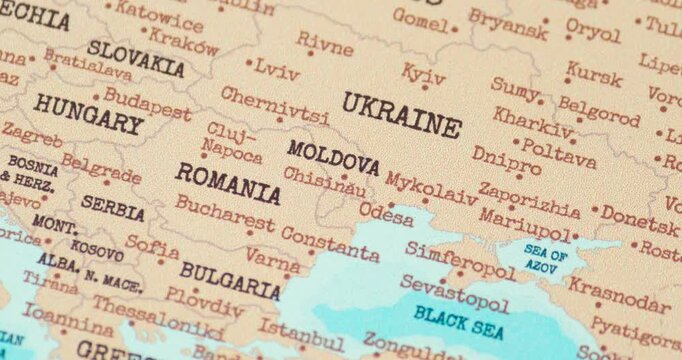 Zoom in view of moldova on a vintage political world map