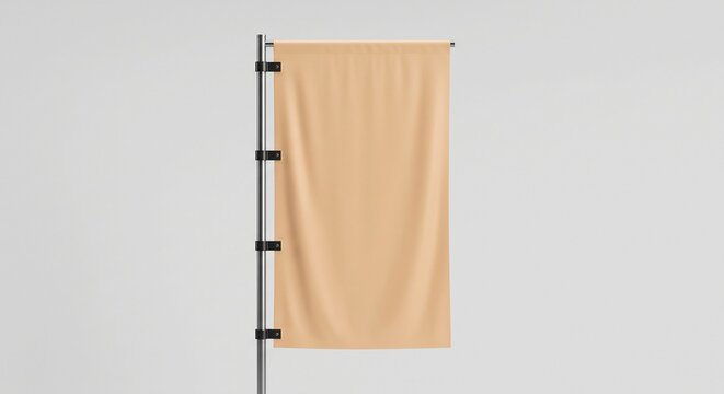 Blank vertical fabric banner flag mounted on a slim metallic pole against a minimalist studio background for branding presentation.