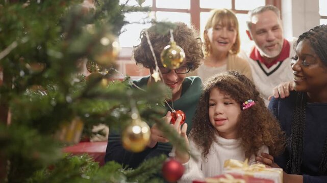 Christmas Family Winter Celebration with Children Decorating Tree and Ornament Together, Sharing Joy, Warmth, Laughter, Relationships, and Festive Holiday Connection at Home