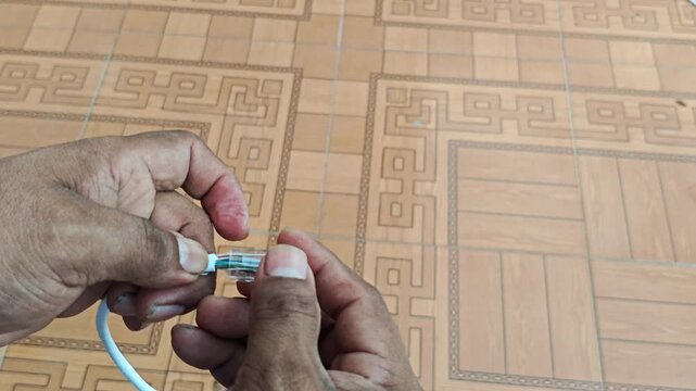 Inserting Ethernet Wires into RJ45 Modular Plug