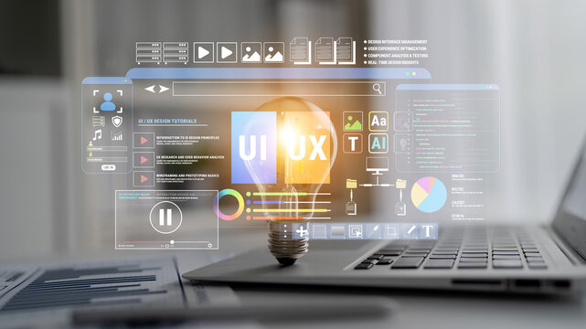 Innovative Concept of User Interface Design with Light Bulb and Digital Elements Displayed on Laptop Screen in Modern Workspace Fluxor.