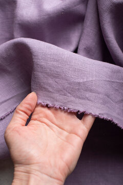 Hand Holding Fringed Edge Lavender Purple Linen Fabric