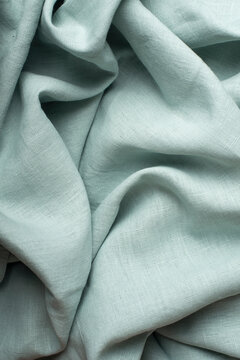 Draped Mint Green Linen Fabric Macro Texture Close Up