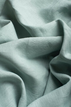 Draped Mint Green Linen Fabric Macro Texture Close Up