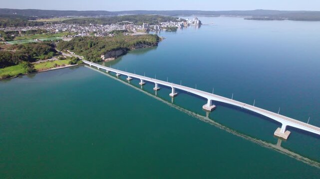 雄大な能登島大橋を旋回して捉えるドローン空撮 / Aerial circling view of Notojima Bridge