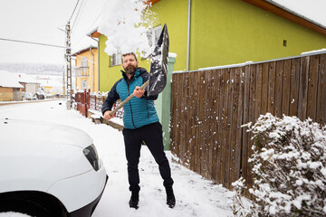 Fototapeta premium snow shoveling after snow storm