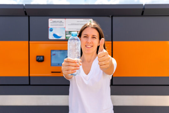 Recycling station with plastic bottle and thumbs up.