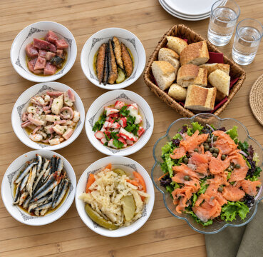 Mediterranean aperitif plates and somon salad, breads 