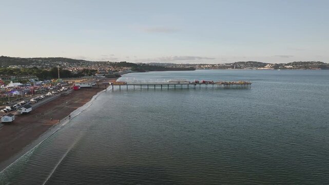 Aerial view of Paignton Pier and Beach from a drone, Paignton, Devon, England, United Kingdom