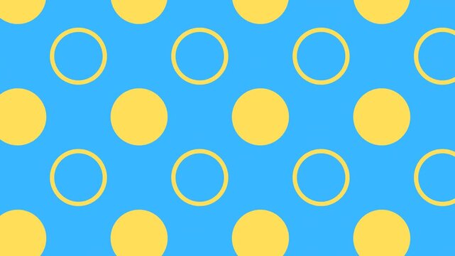 Repeating animation showing colorful circles moving across a vibrant blue surface. A dynamic visual loop.