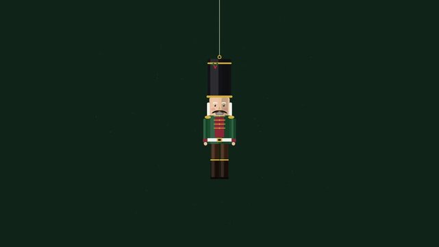Swinging nutcracker ornament hanging on dark green background, for christmas holiday, decor