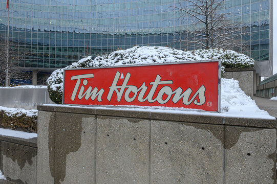 Tim Hortons restaurant sign, Toronto on a winter day