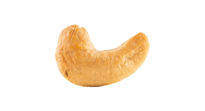 Single roasted cashew nut isolated on black background