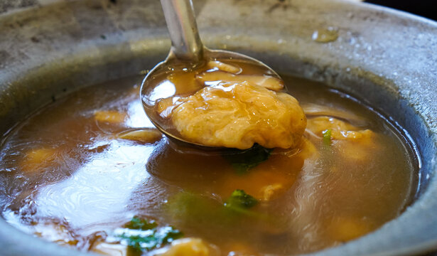 Plant-Based Fish Maw Lifted from Hot Vegetarian Soup (Krapho Pla Nam Daeng Jae)