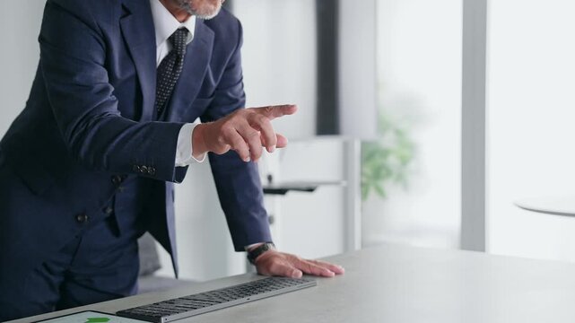 A male business person operating a screen in mid-air. VR, virtual, DX, business, IT, touch, operation, screen