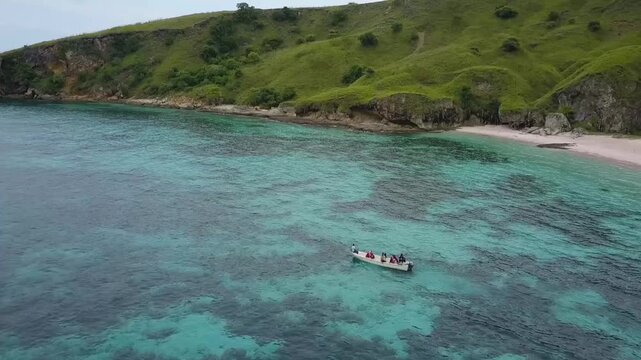 Amazing aerial view of beach island in Pesawaran, Pahawang, Lampung. One of the best islands for vacation and doing beach activities, swimming, snorkeling, and watching sunsets and sunrises.