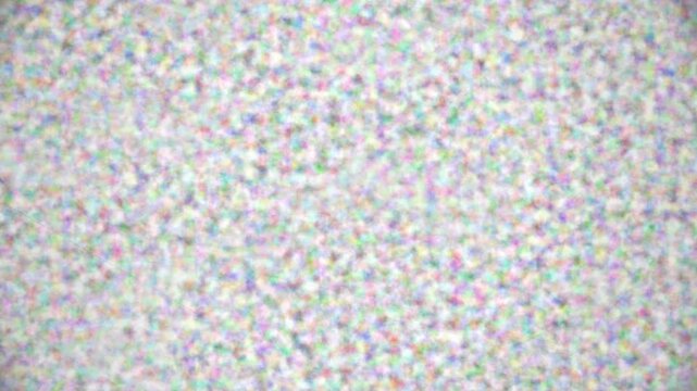 Analog television signal static showing distorted electronic noise pattern background texture in wide format with noise
