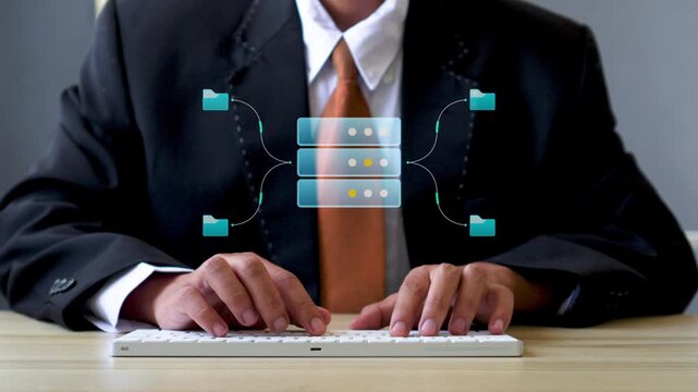 Close-up of businessman typing on keyboard with floating 3D server database and media icons