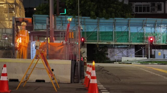 Structural view of heavy civil engineering and construction work for modern highway extensions, overpasses, bridges, and elevated skyways amid an urban landscape in Singapore.