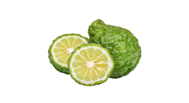 Fresh whole and sliced kaffir limes isolated on black background