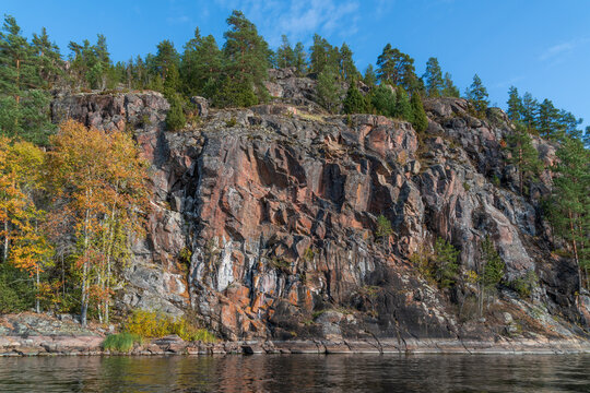Rocky shores of Lake Ladoga near the village of Lumivaara on a sunny autumn day, Ladoga Skerries, Lahdenpohya, Republic of Karelia, Russia