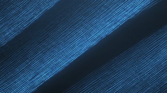 Abstract blue diagonal stripe pattern with brushed metallic texture and dark shadows for modern design background