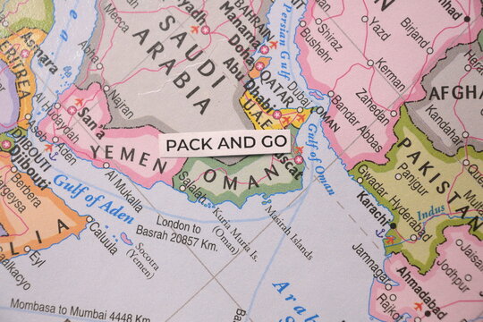 Pack and go label placed over Middle East map.