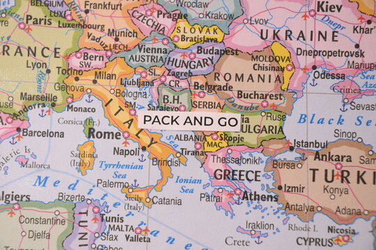 Pack and Go text on Italy Balkans and Southern Europe political map background travel adventure