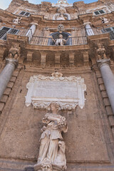 Baroque stone facade with statues and columns in Quattro Canti Square, Palermo, Italy © Uvamenfoto