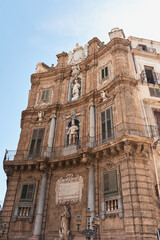 Baroque stone facade with statues and columns in Quattro Canti Square, Palermo, Italy © Uvamenfoto