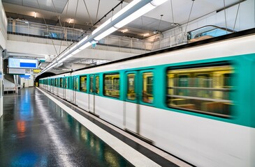 Fototapeta premium Train at Aime Cesaire metro station in Paris, France on July 20, 2022.