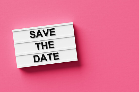 Lightbox displaying Save the Date message on pink background