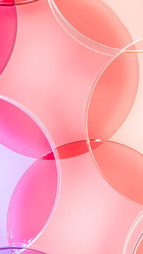 Abstract overlapping transparent pink and red circles in modern design
