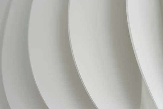 White abstract wave shape forms a minimalist background