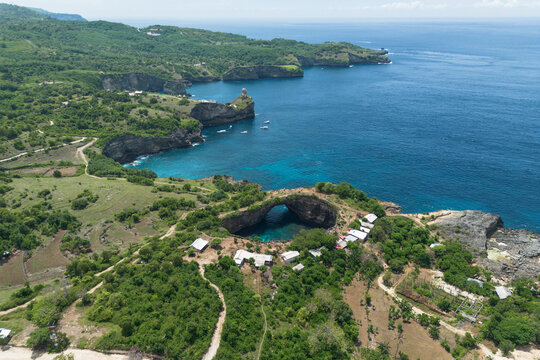 Aerial view reveals a tropical paradise cove in Nusa Penida