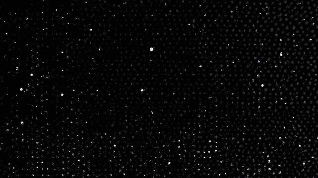 Monochrome halftone dots texture background loop, vintage noise grain effect, retro halftone pattern overlay for video transition
