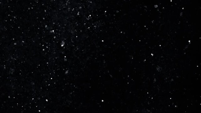 Floating Dust Particles Overlay on Black Background, Glowing White Specs in Motion, Cinematic Bokeh Dust Background