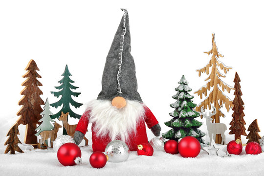 Bright winter Christmas arrangement with snow, wooden decoration, snowmen and baubles, isolated on pure white