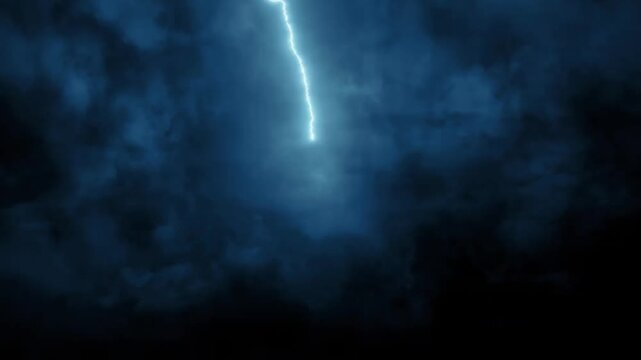 Dramatic thunderstorm with bright lightning flashes and dark clouds in the night sky.