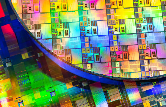 silicon wafer for manufacturing semiconductor of integrated circuit.Electronic circuit designs have been built onto the wafers using micromaching including photolithography