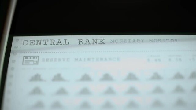 Central bank monetary monitor heading in a drifting screen closeup