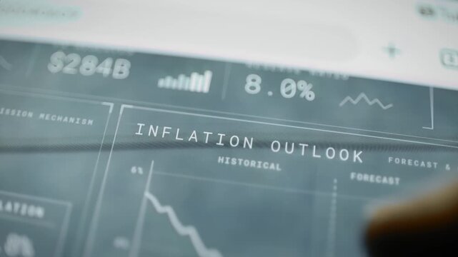 Inflation outlook header beneath reserve metrics and a nearby fingertip