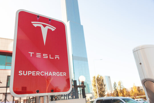 Astana, Kazahstan - October 1, 2026: electric car Tesla charging on supercharging station