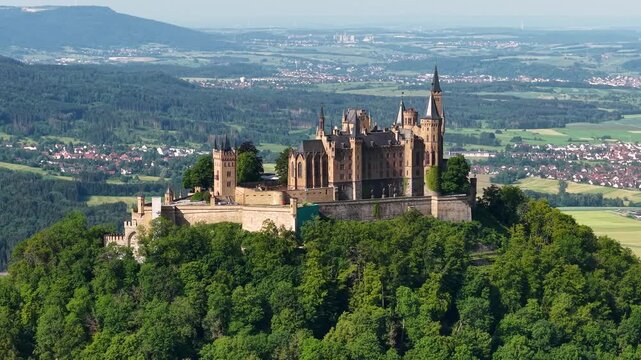 Hohenzollern Castle, located in Baden‑W&uuml;rttemberg in southern Germany, is a hilltop fortress known for its dramatic architecture, panoramic views, historic ramparts, royal heritage.